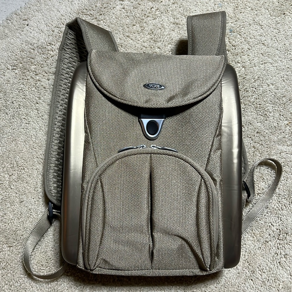 Authentic Tumi backpack, golden color. New without tags.